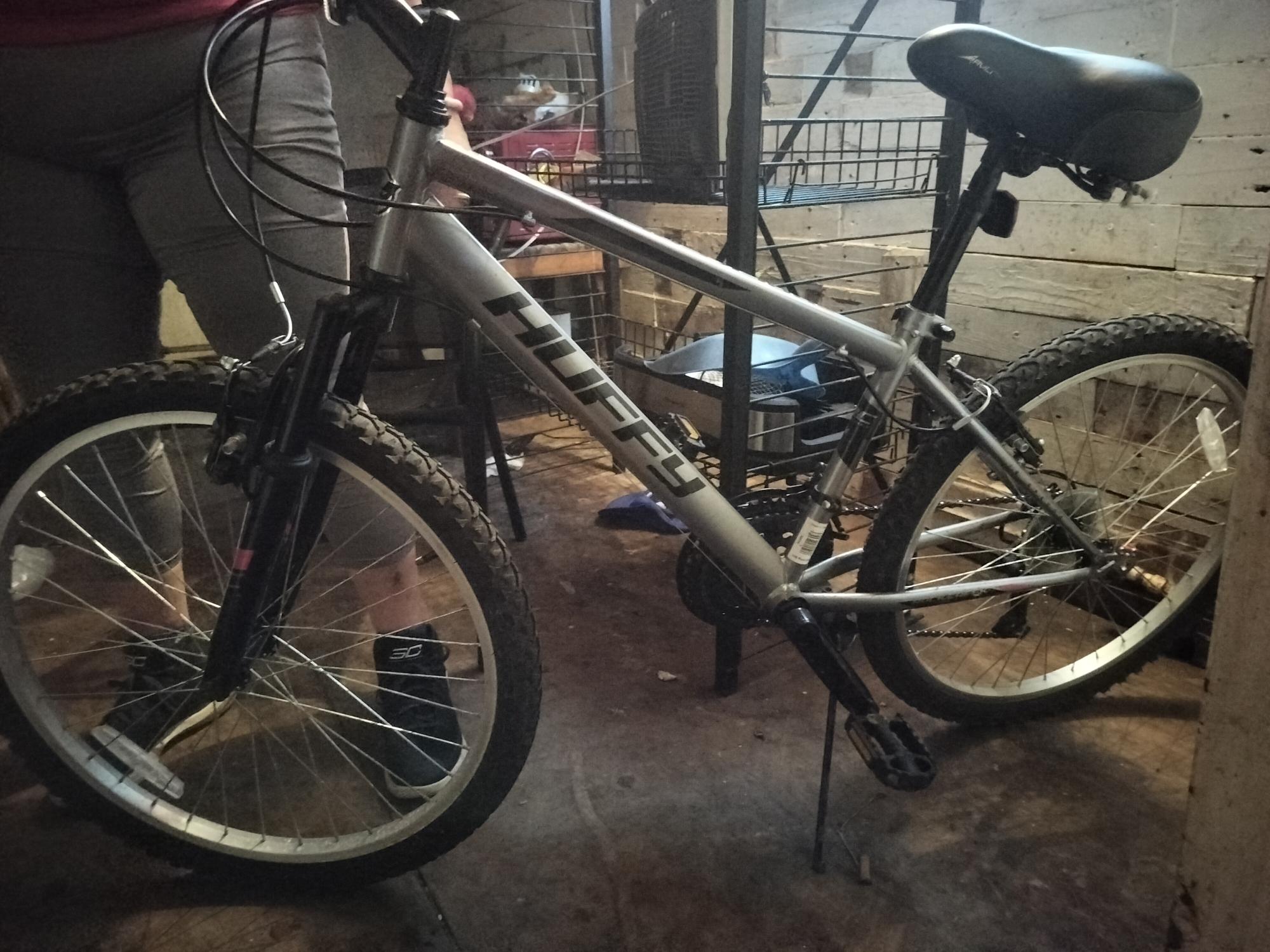2024 Huffy 24 B Rock Creek Silver, gray or bare metal and Black