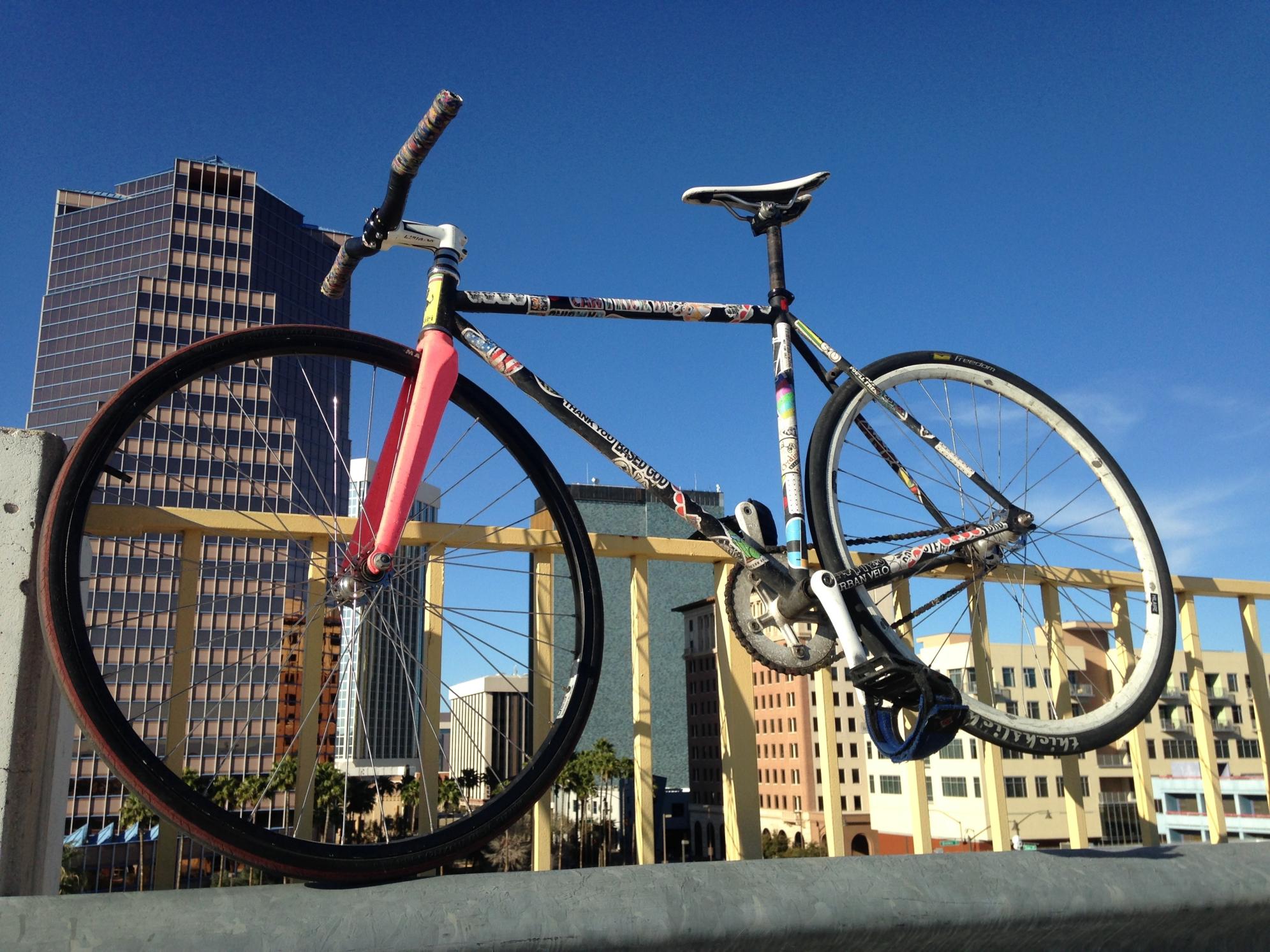 Generic steel frame, matte black, covered in stickers Black