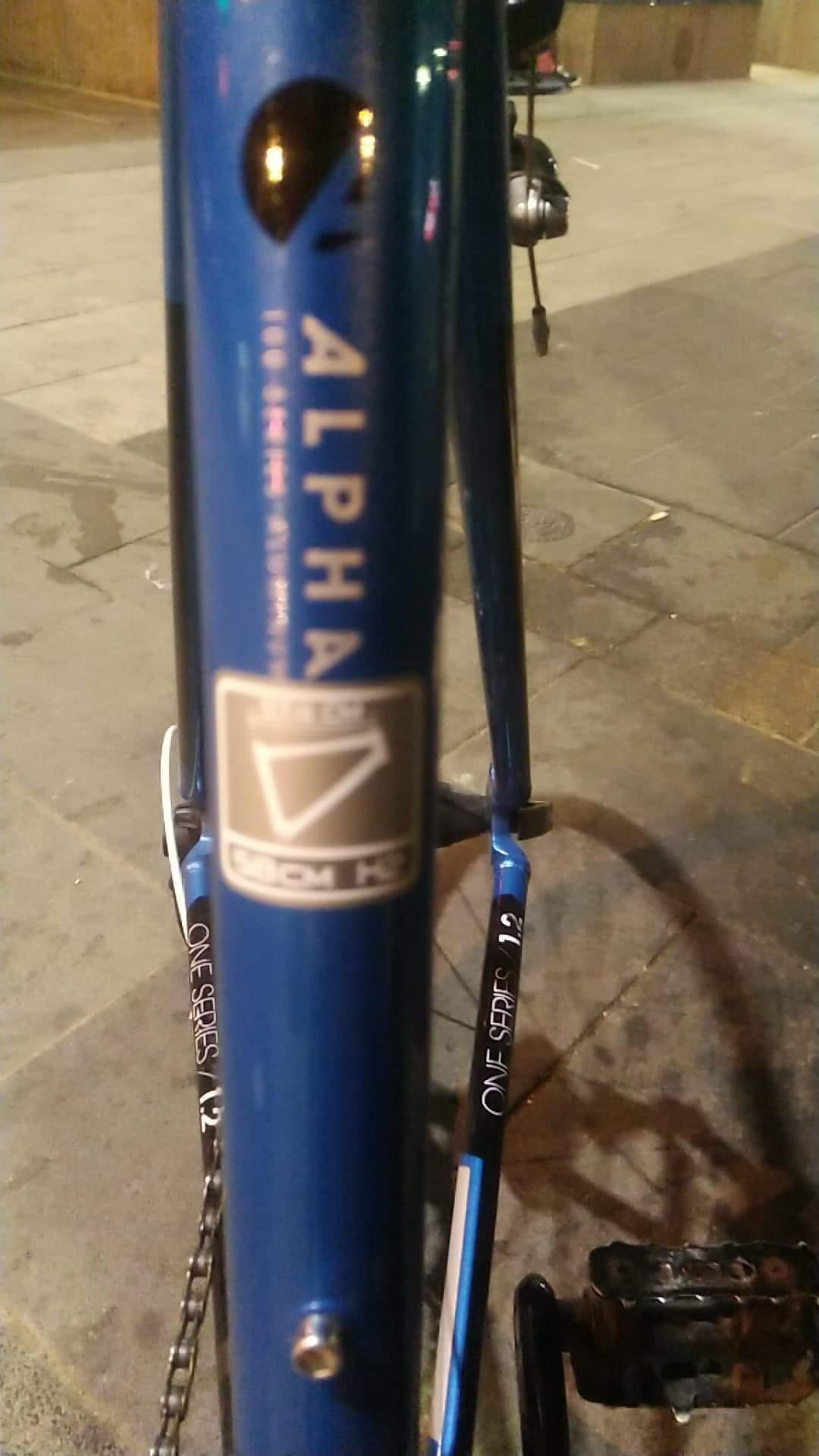 Trek 1.2 Blue, White, and Silver, gray or bare metal