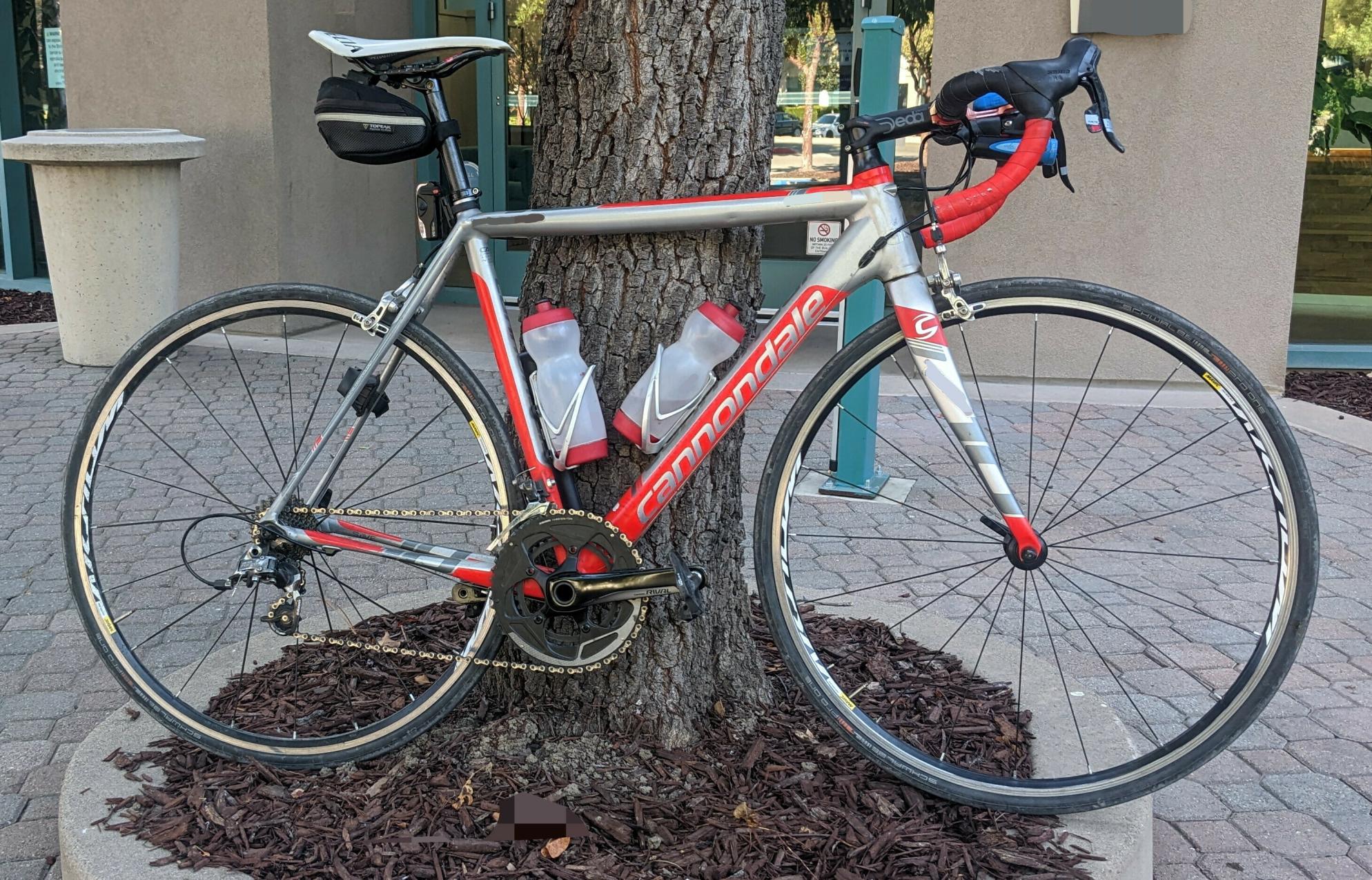 2015 Cannondale CAAD10 Silver/Orange Force Racing Edi... Silver, gray or bare metal
