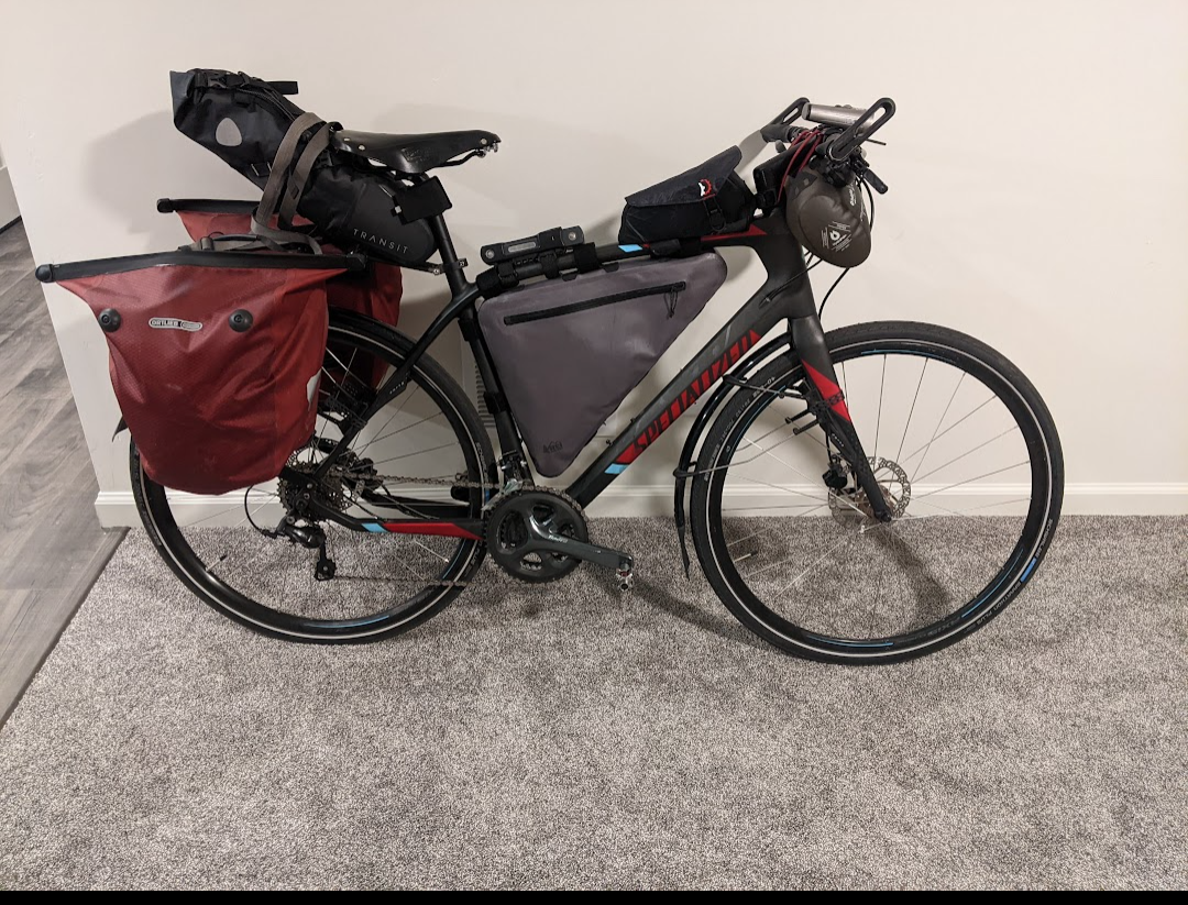 Specialized Silver, gray or bare metal, Red, and Teal