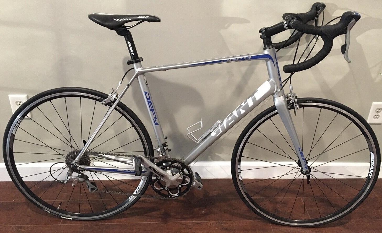 2013 Giant Defy 2 Silver, gray or bare metal, Blue, and White
