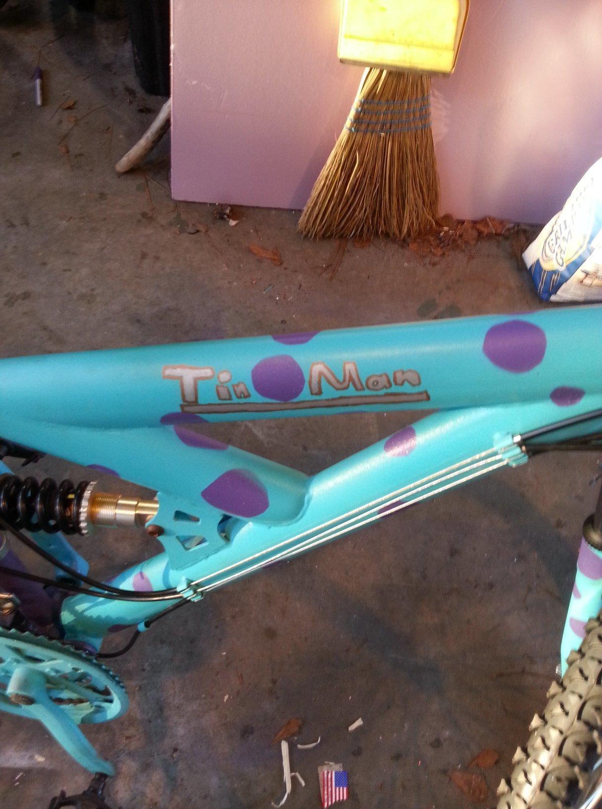 NEXT- Says TinMan in place of brand Full suspension Teal and Purple