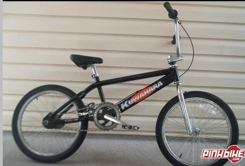 2003 Kuwahara Orbit Black, Silver, gray or bare metal, and Stickers tape or other cover-up