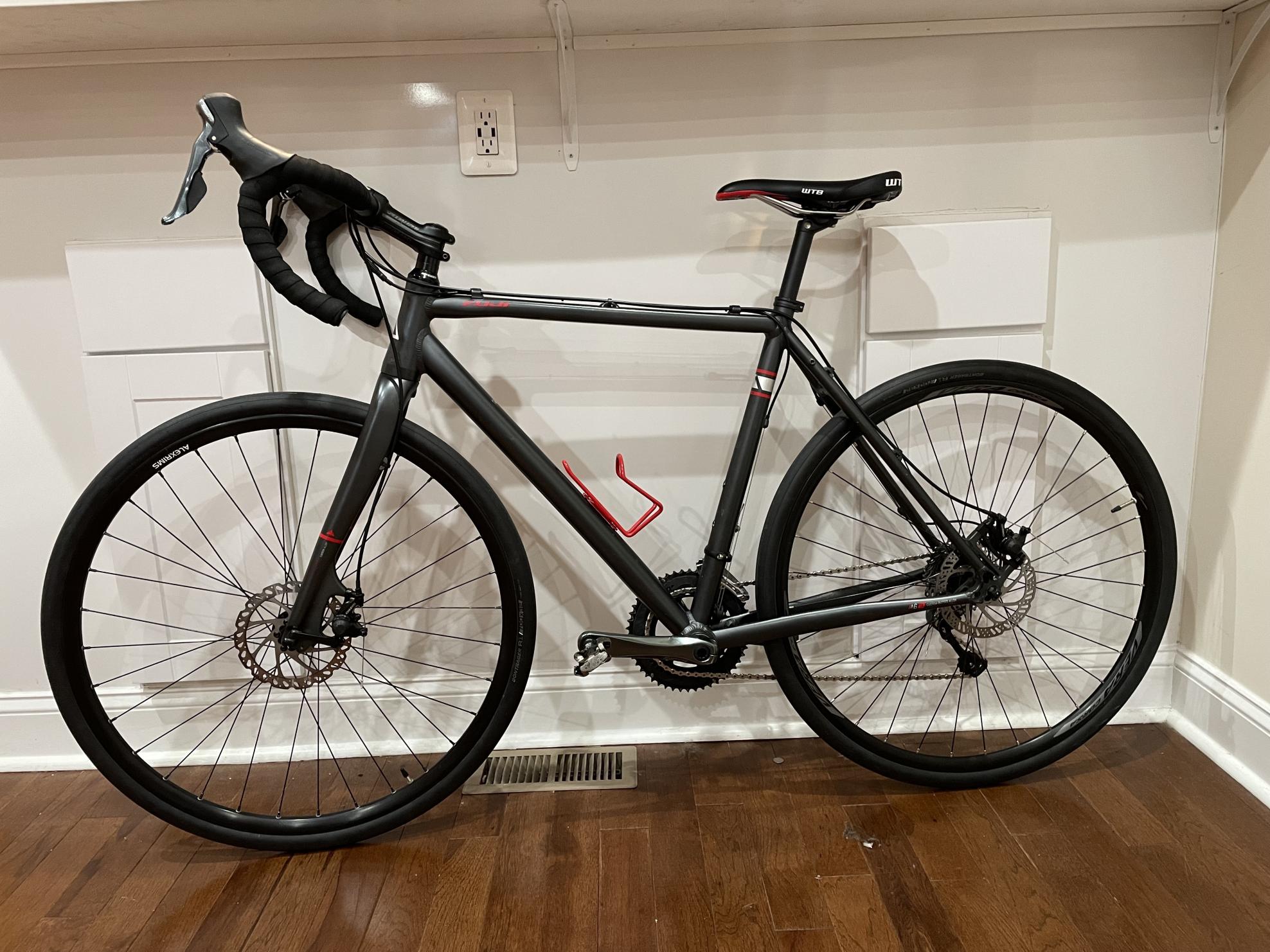 2024 Fuji Tread Silver, gray or bare metal and Red