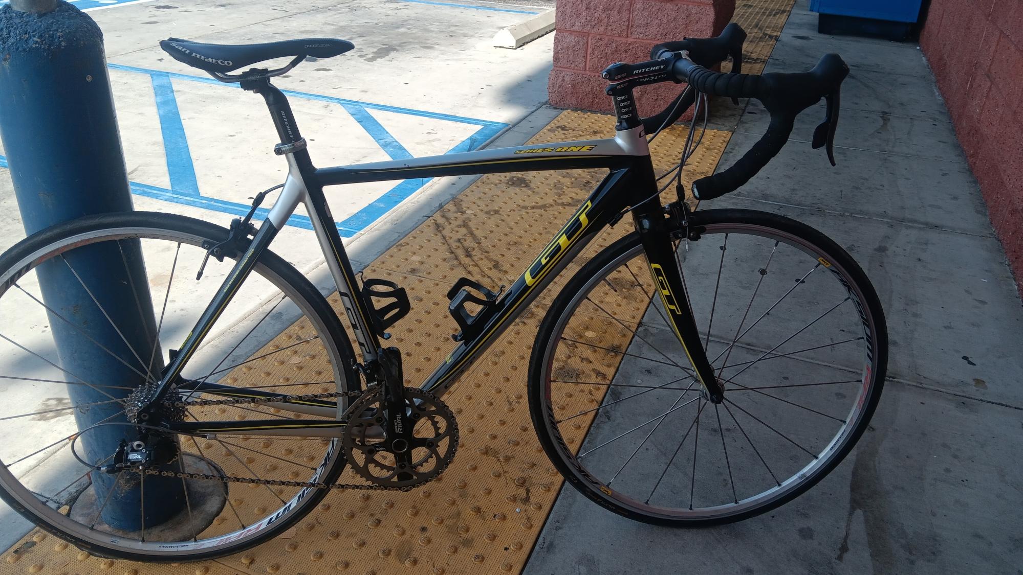 2010 GT Bicycles SERIES 1 Black, Yellow or Gold, and Silver, gray or bare metal