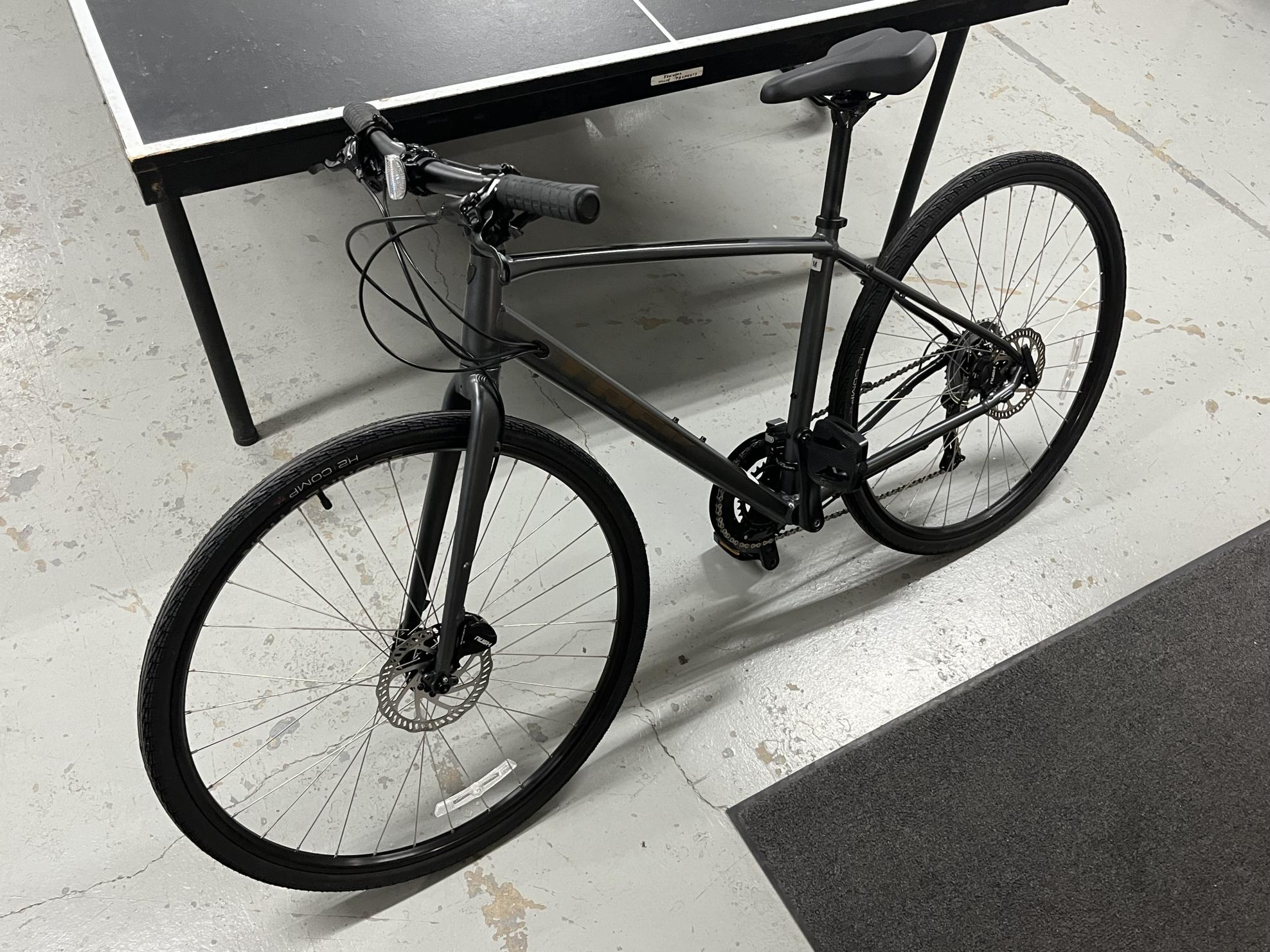 Trek Silver, gray or bare metal and Black