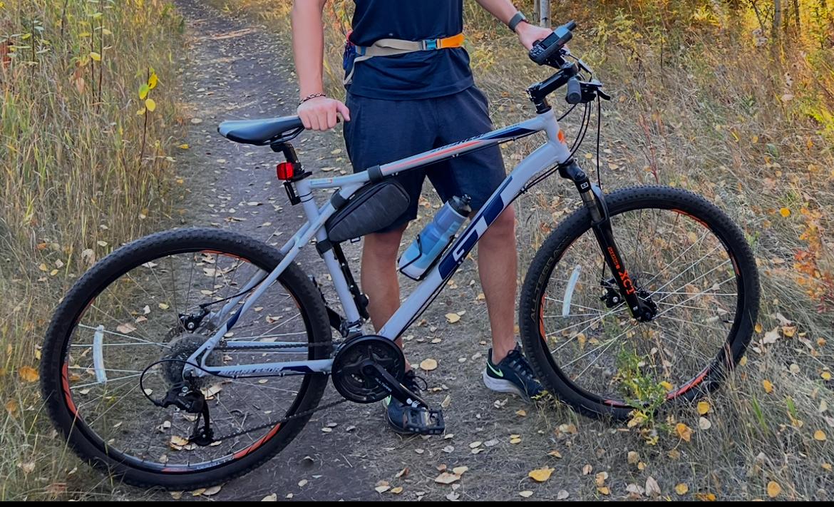 2025 GT Bicycles AGGRESSOR PRO (Q121) LIGHT Silver, gray or bare metal, Blue, and Orange