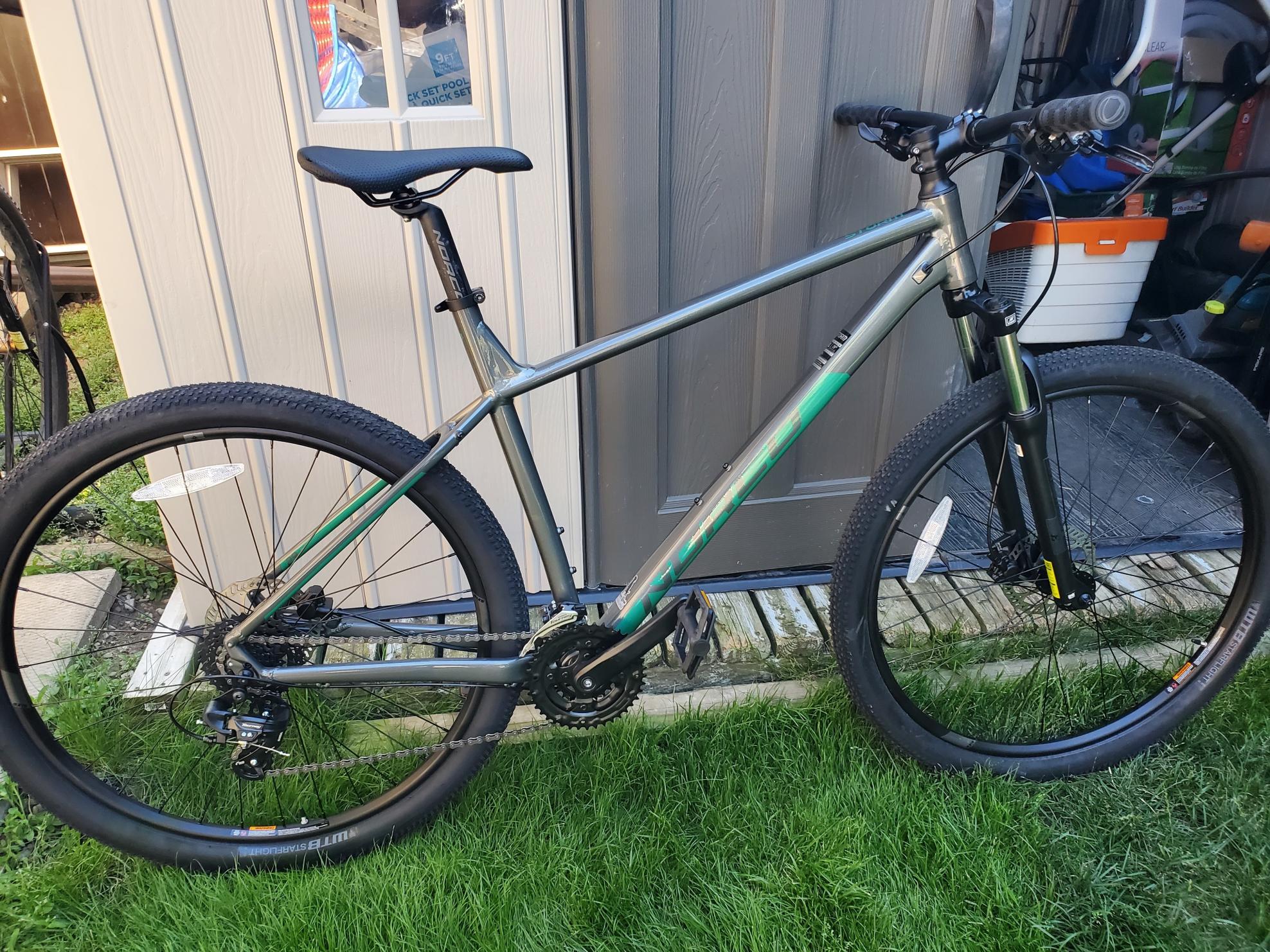 2021 Norco Bikes Storm 4 Silver, gray or bare metal and Green