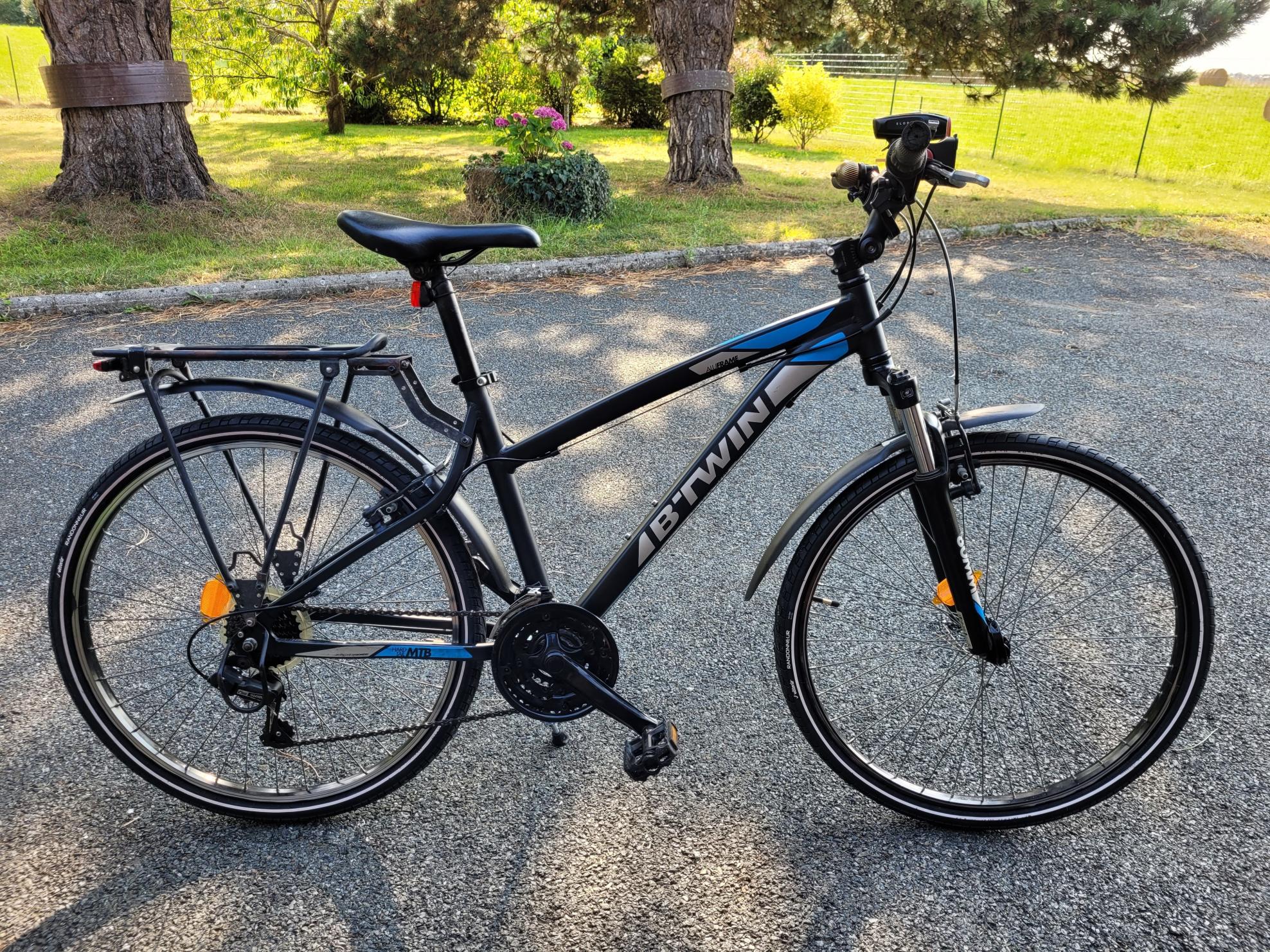 2016 Decathlon Rockrider 340 Silver, gray or bare metal and Blue