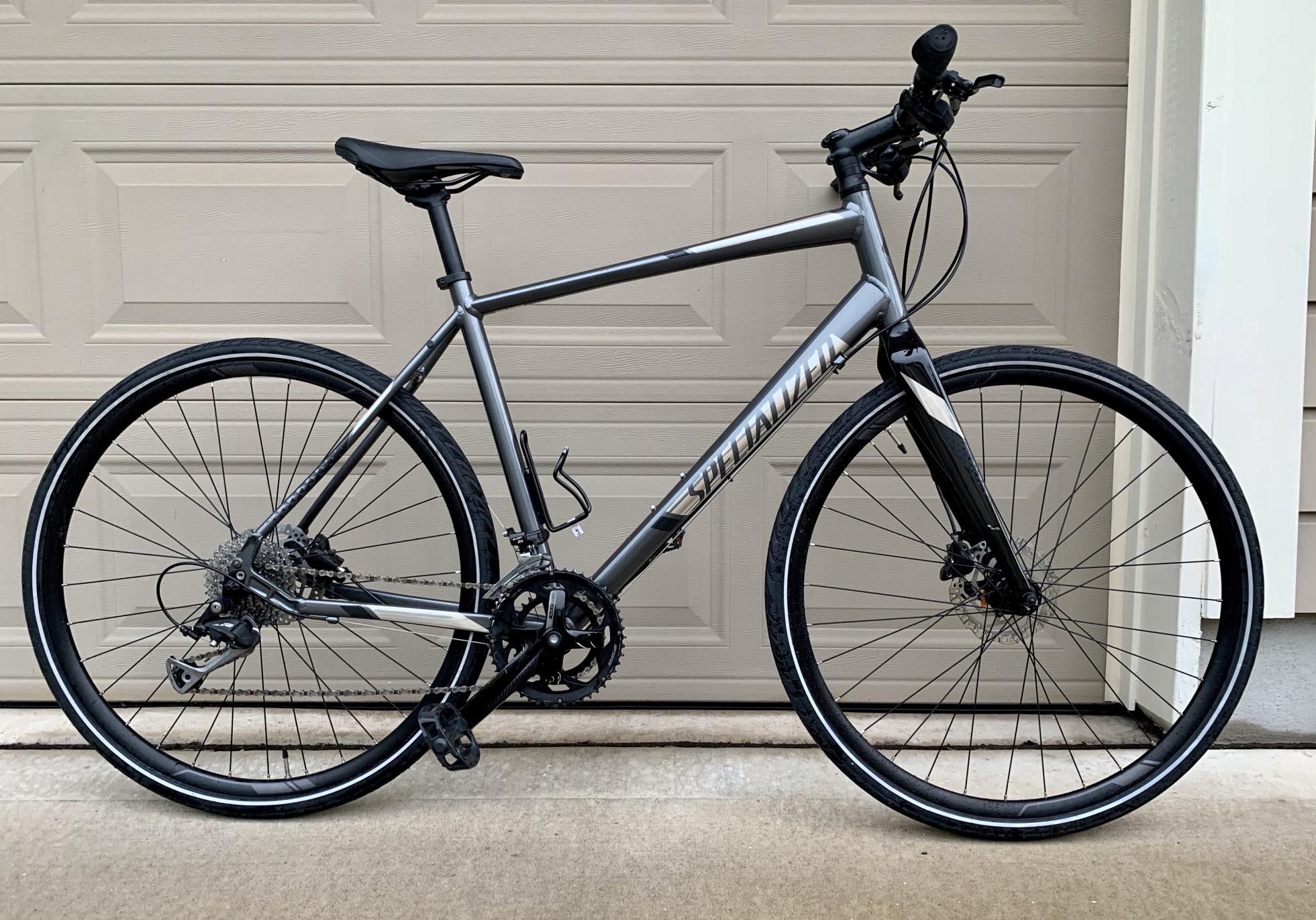 2017 Specialized Sirrus Sport Silver, gray or bare metal and Black