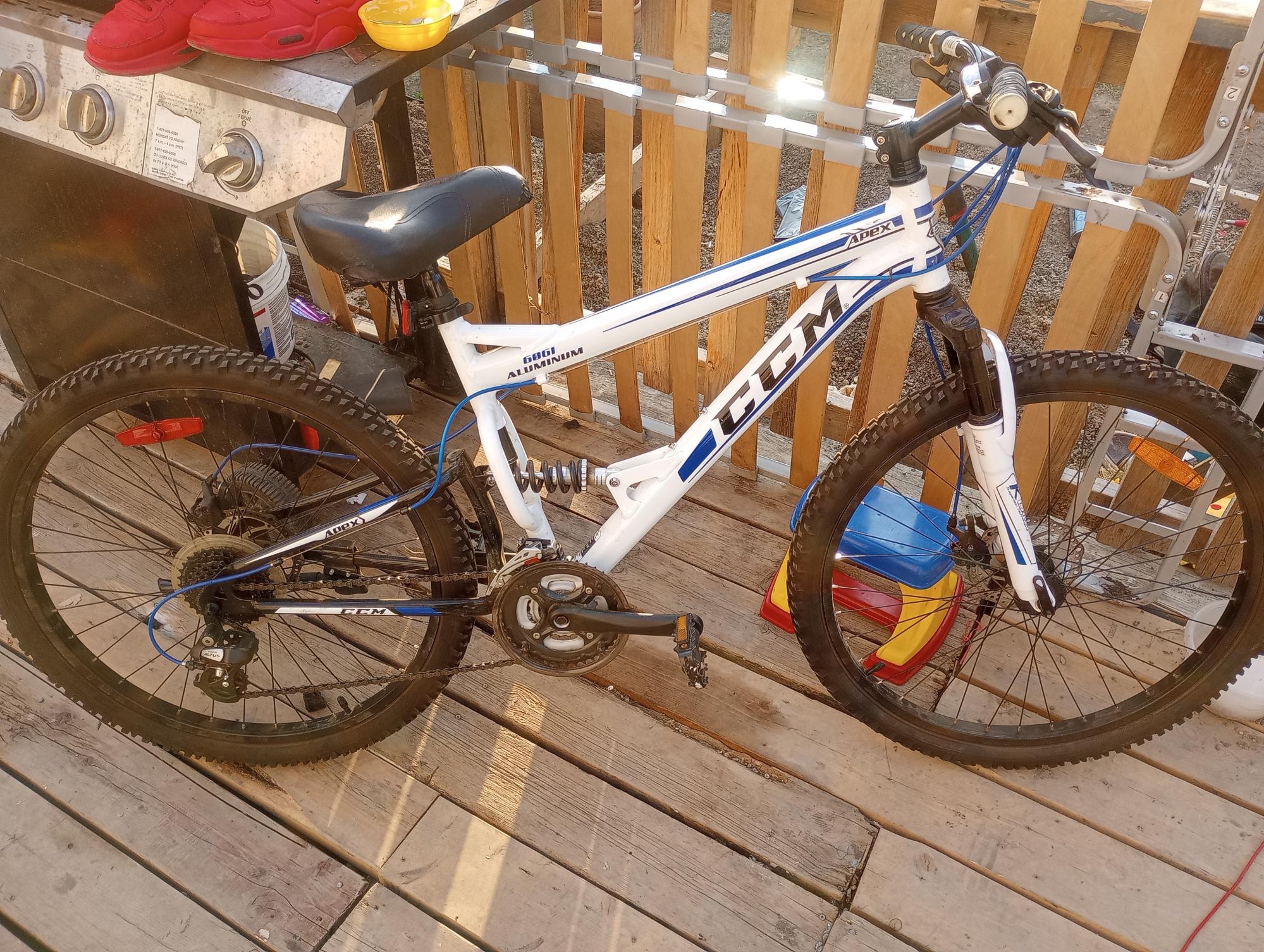 2011 CCM Ccm apex 6061 aluminum White, Blue, and Black