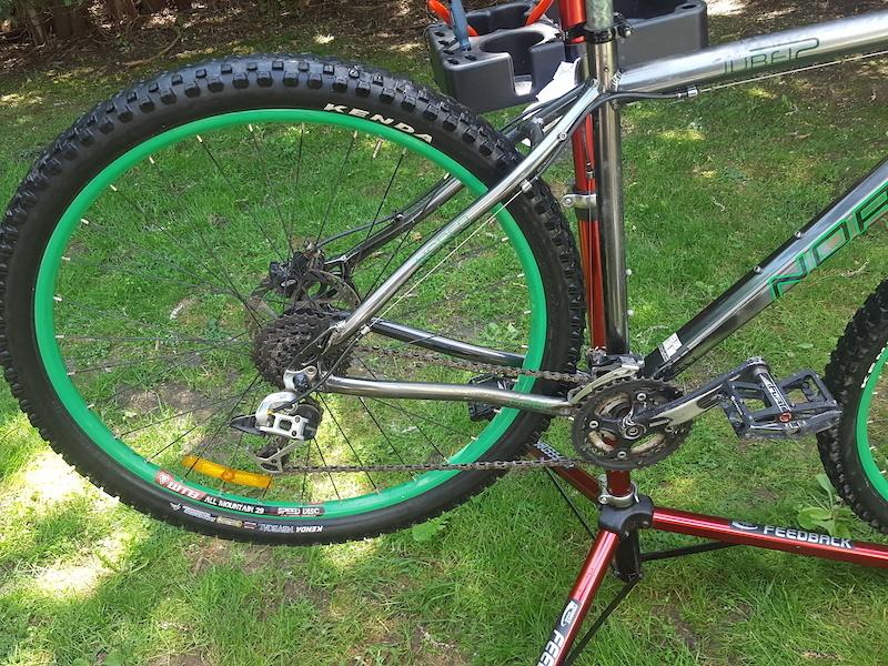 Norco Bikes Jubei 2 Silver, gray or bare metal and Green