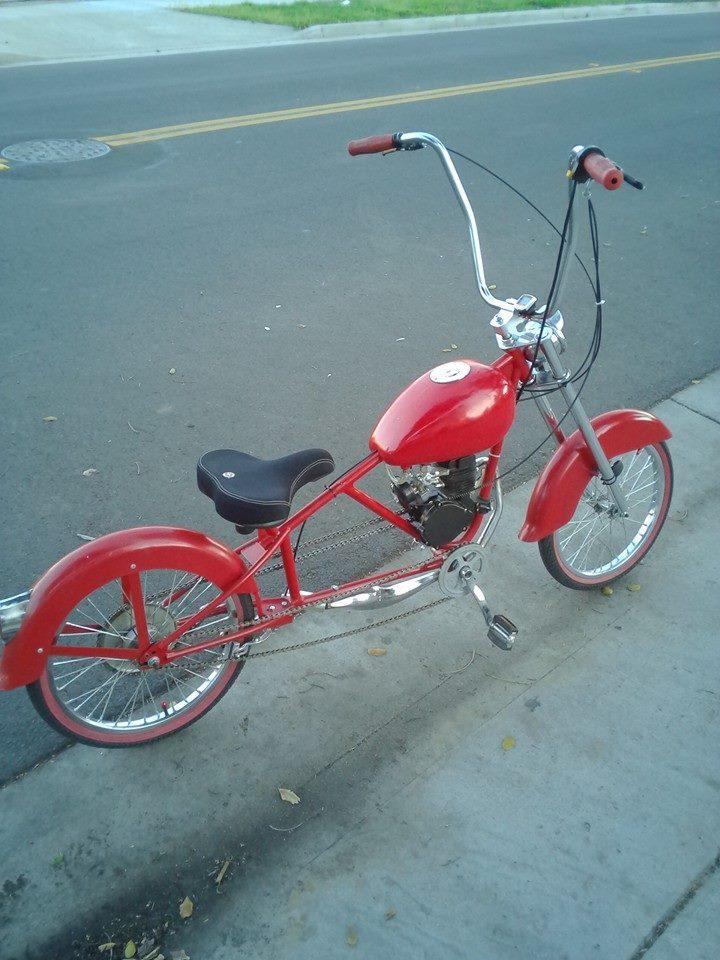 1957 Schwinn chrome ape hanger handle bars, motorized custom frame streched, chopper style with g...