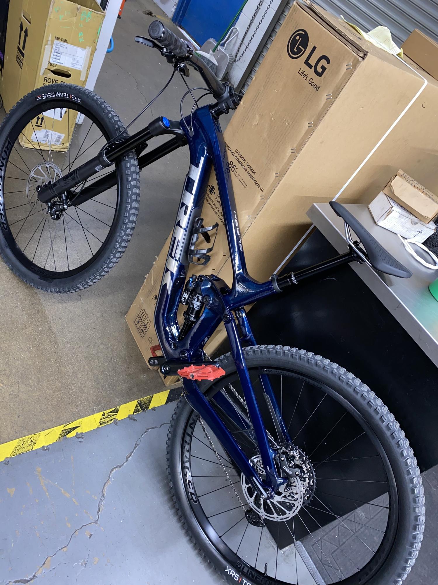 2022 Trek Slash 9.7 Blue and Silver, gray or bare metal