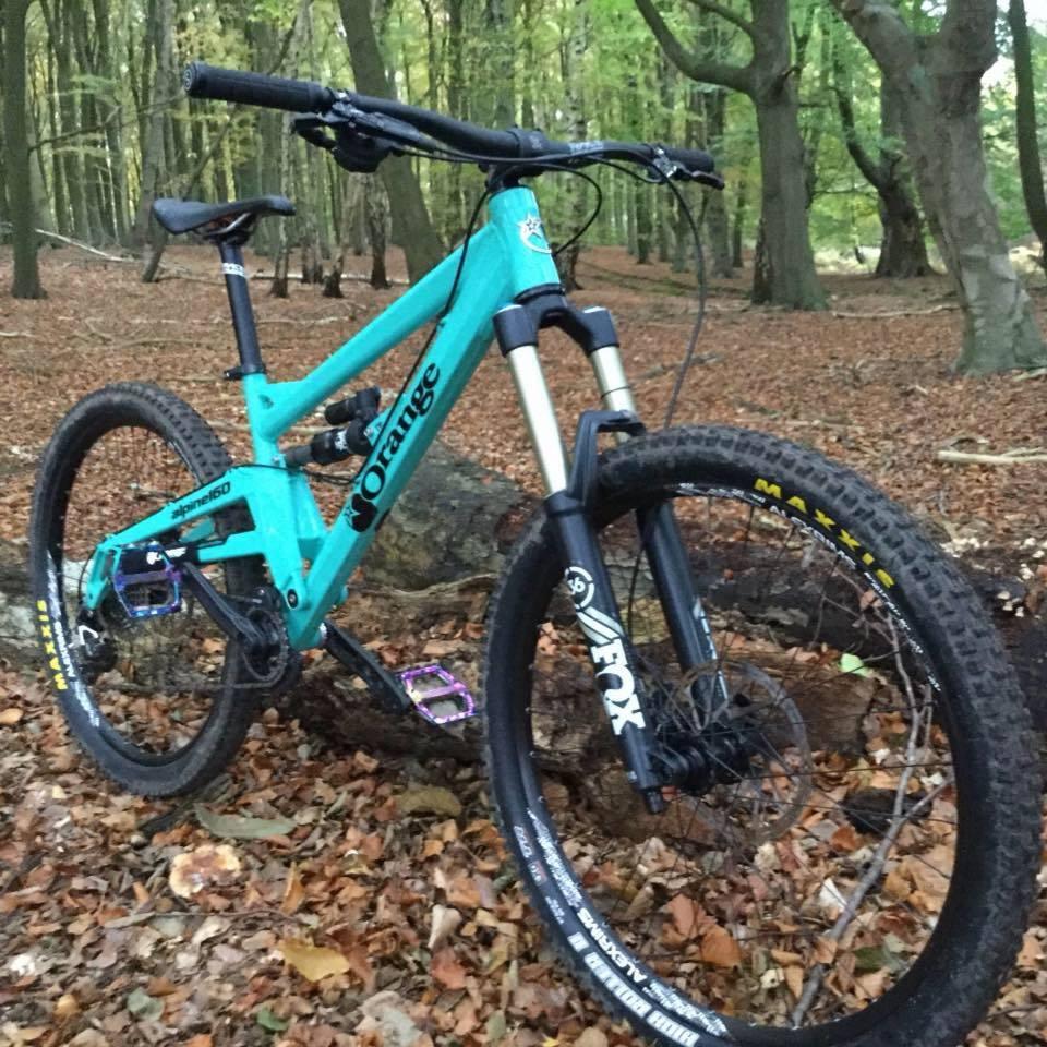 Orange mountain bikes Teal