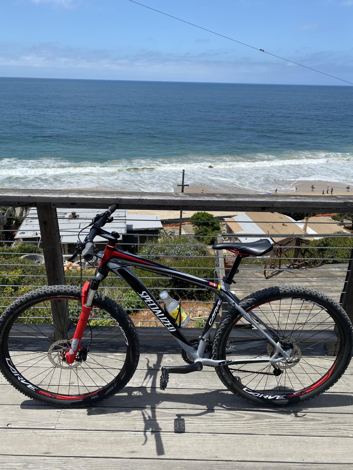2012 Specialized Carve Comp 29 Red, Silver, gray or bare metal, and Black