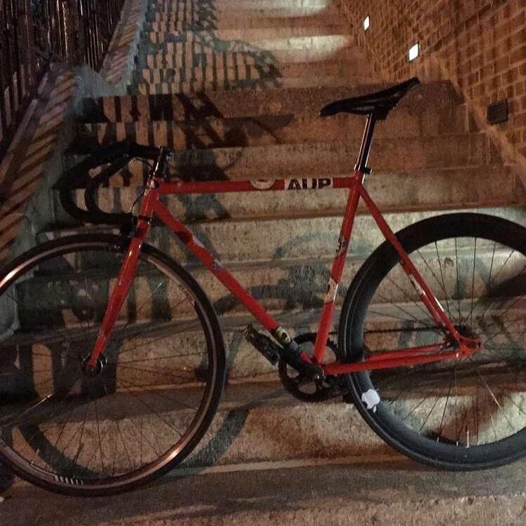 I dont even know Dont know, but a red fixie with black tapes on handle bars Red