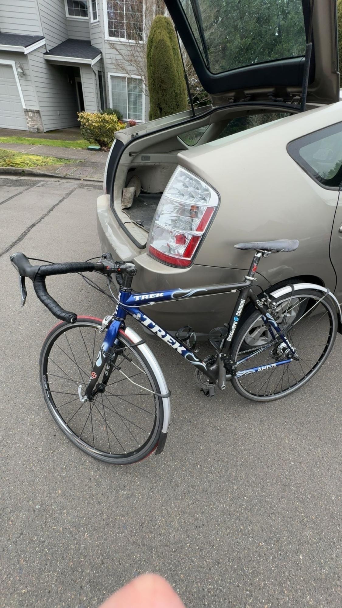 2025 Trek Discovery Channel OCLV Blue and Silver, gray or bare metal