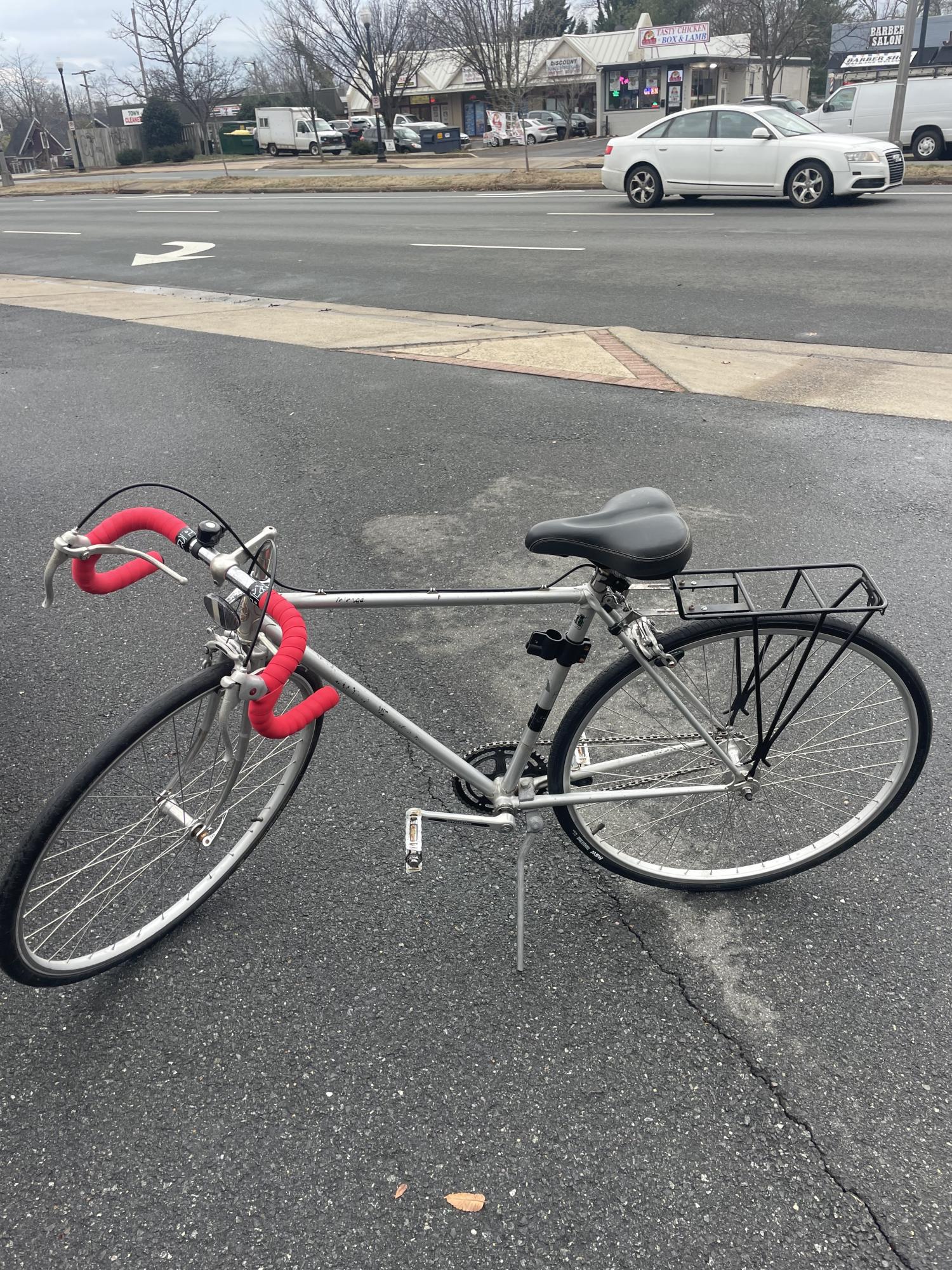 1980 Motobecane Single speed, bright red handlebars Silver, gray or bare metal and Red