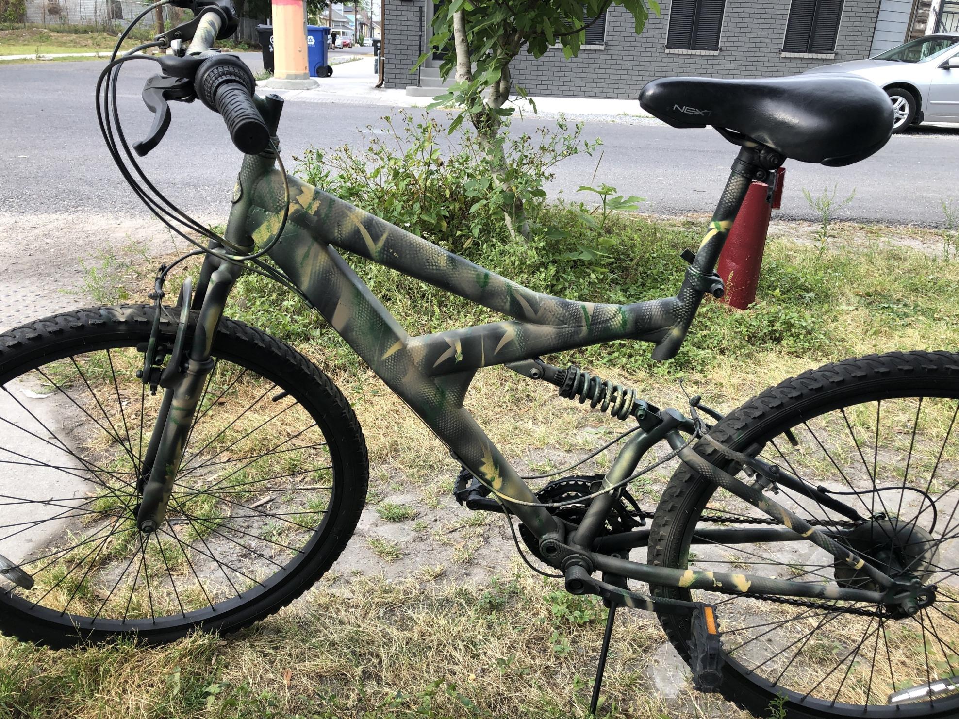 2017 Ozone Mountain Bike with shocks and spring Green and Stickers tape or other cover-up