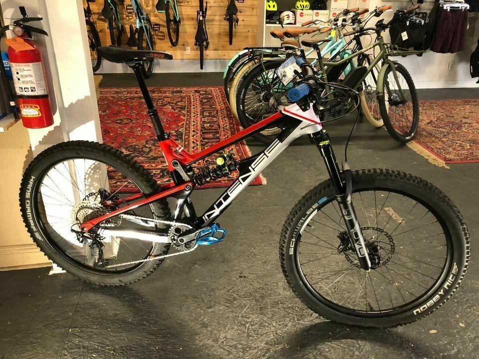 2021 Intense Tracer Red, White, and Black