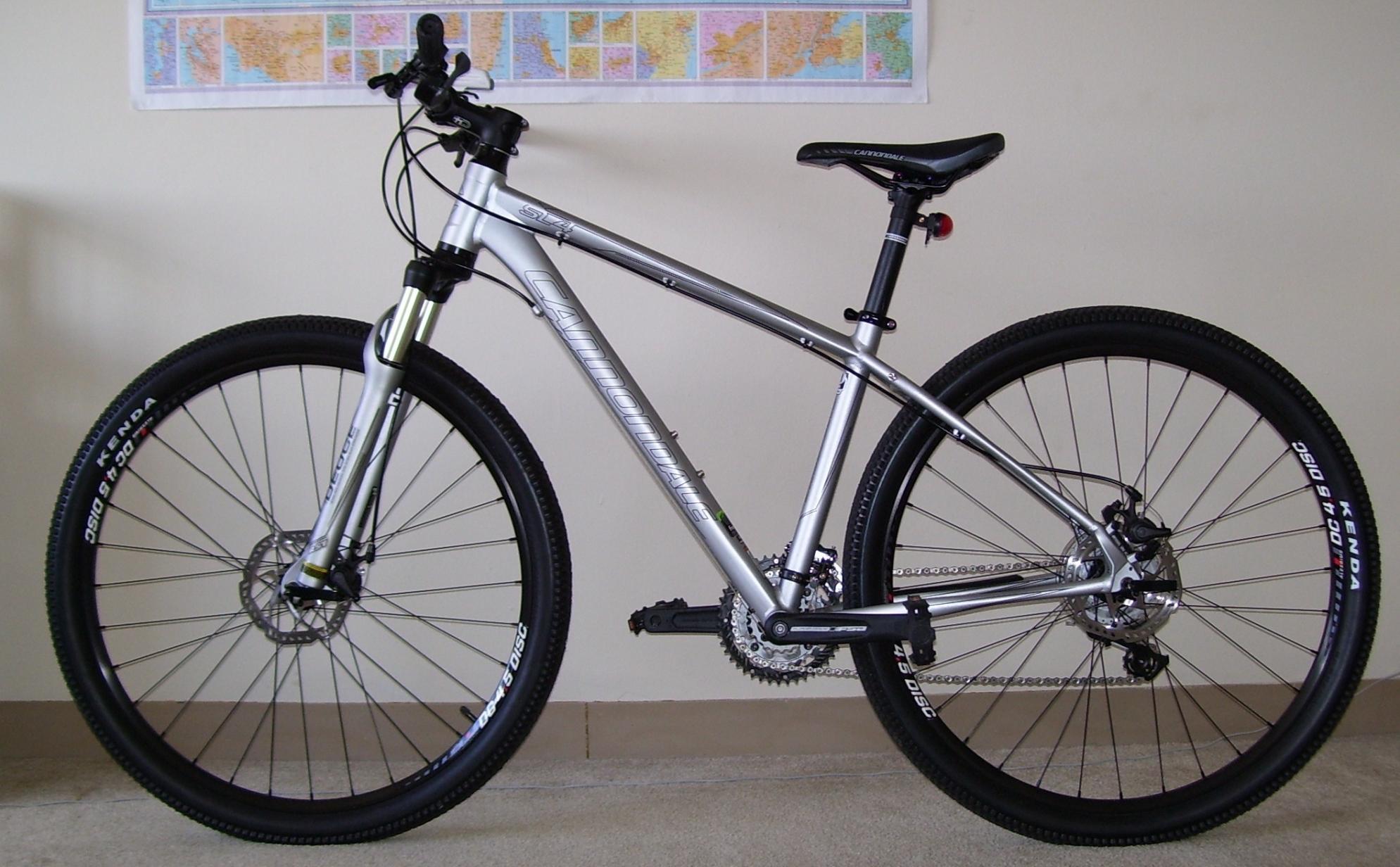 2011 Cannondale Trail SL 29er 4 bicycle Silver or Gray