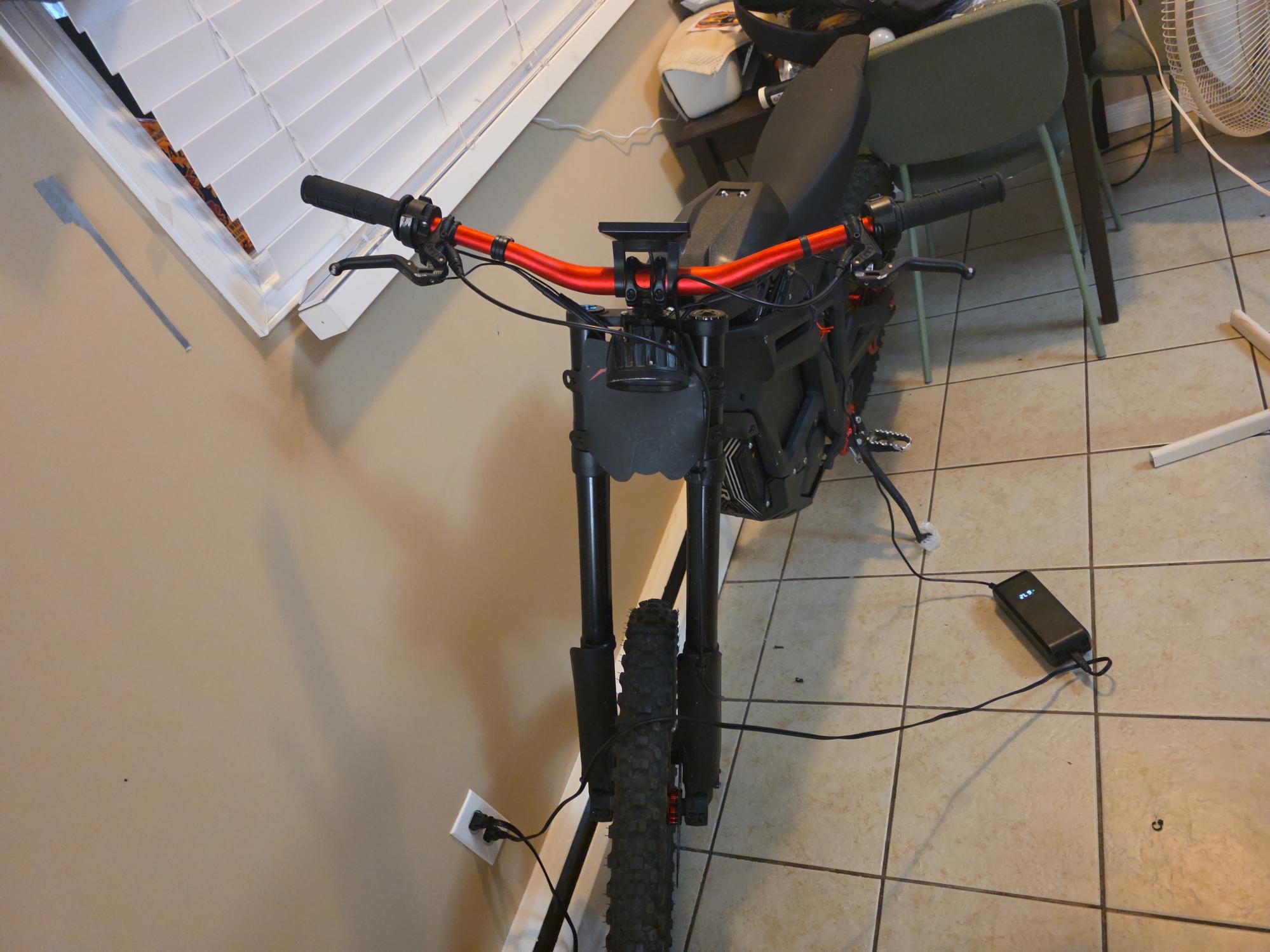 2024 Electric Bike Technologies MX4 Sting R e-motorcycle/e-dirtbike Black and Red