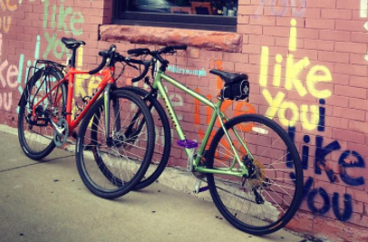 2008 Kona Woman's Hybrid w/purple pedals Green