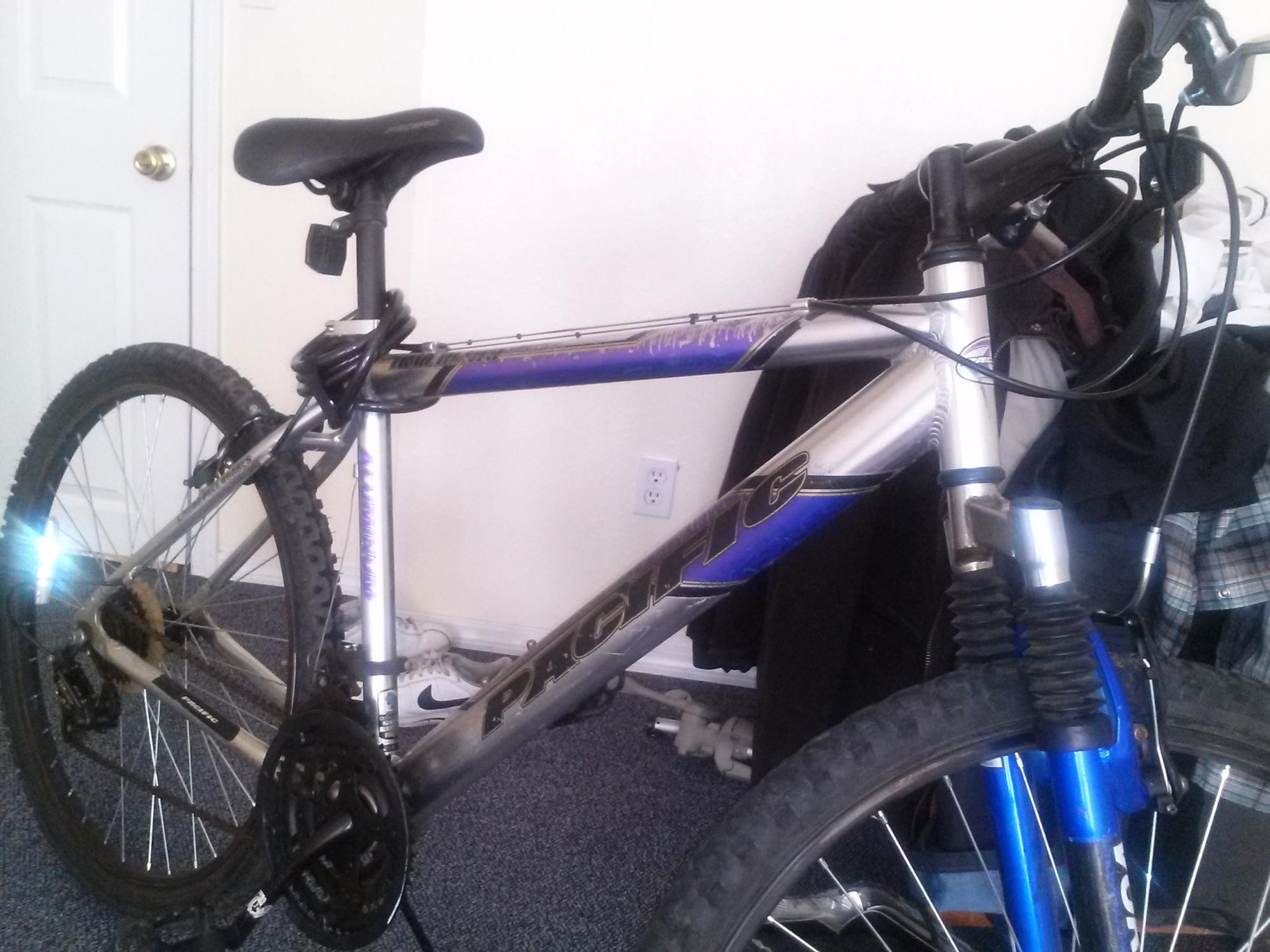 Pacific Cycle  Silver or Gray, Blue, and Stickers tape or other cover-up