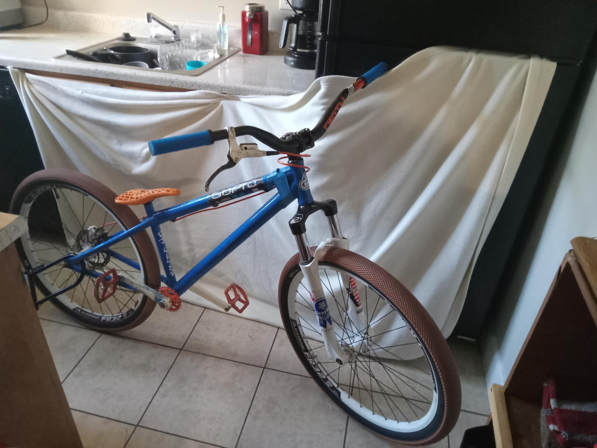 2009 SE Bikes Blue, White, and Orange